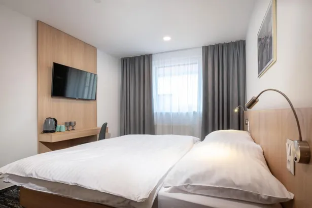 a guest room at Vila Efekt hotel